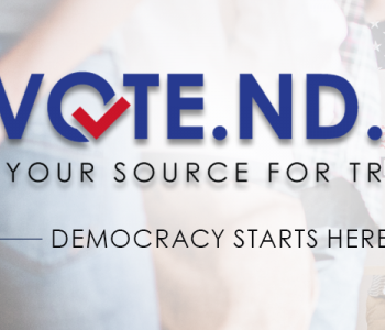 Vote.nd.gov logo over a picture of people at a polling location.